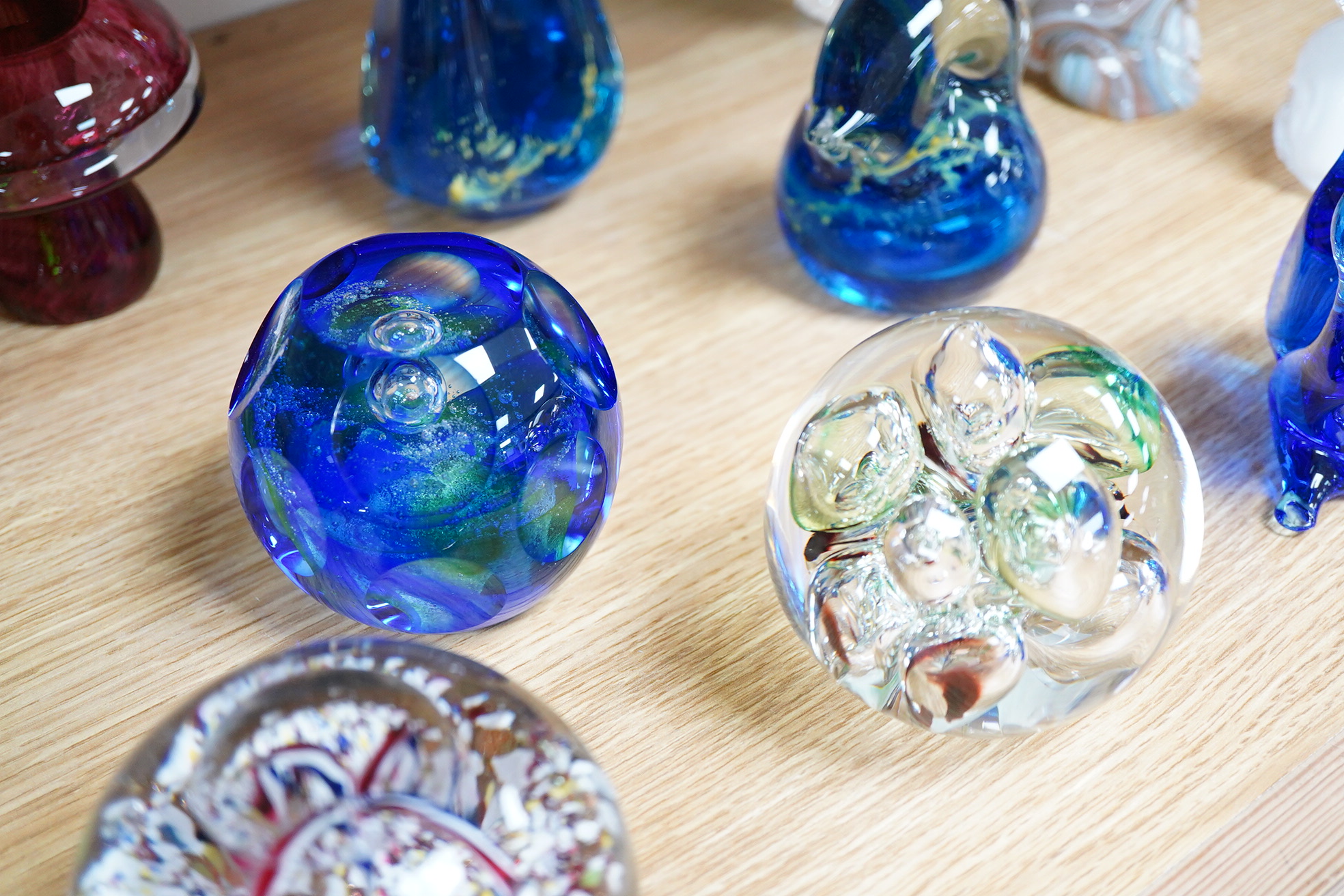 A large collection of 20th century paperweights to include Svaja, Mdina and some novelty examples in the form of animals, largest 27cm high
